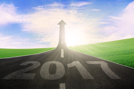 65628475 - image of an empty highway with number 2017 and upward arrow. symbolizing better future